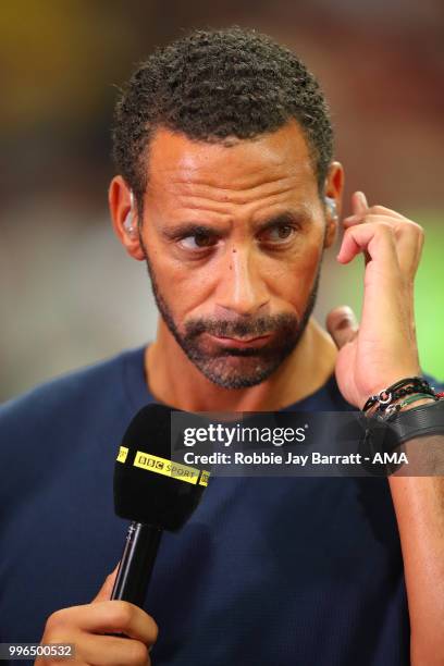 Rio Ferdinand performs pundit duties for the BBC at the end of the 2018 FIFA World Cup Russia Semi Final match between Croatia and England at...