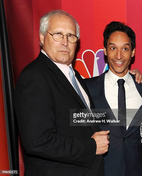 Actors Chevy Chase and Danny Pudi attend the 2010 NBC Upfront presentation at The Hilton Hotel on May 17, 2010 in New York City.