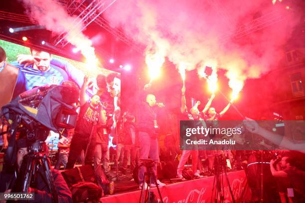 Fans of Croatia celebrate as they gather at Ban Jelacic Square for a public viewing event to watch 2018 FIFA World Cup Russia Semi Final match...