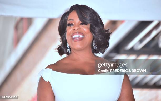 Actress Niecy Nash reacts during her Hollywood Walk of Fame Star ceremony in Hollywood, California on July 11, 2018. - Niecy Nash was the recipient...