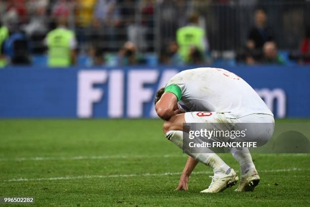 England's forward Harry Kane reacts after the Russia 2018 World Cup semi-final football match between Croatia and England at the Luzhniki Stadium in...