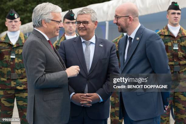 Belgium's Vice-Prime Minister and Foreign Minister Didier Reynders, Minister of Defence and Public Service Steven Vandeput and Prime Minister Charles...