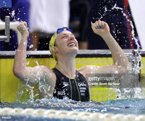 Sarah Ryan of Australia celebrates after winning the Womens 100m Freestyle at the Chandler Aquatic Centre during the Goodwill Games in Brisbane,...