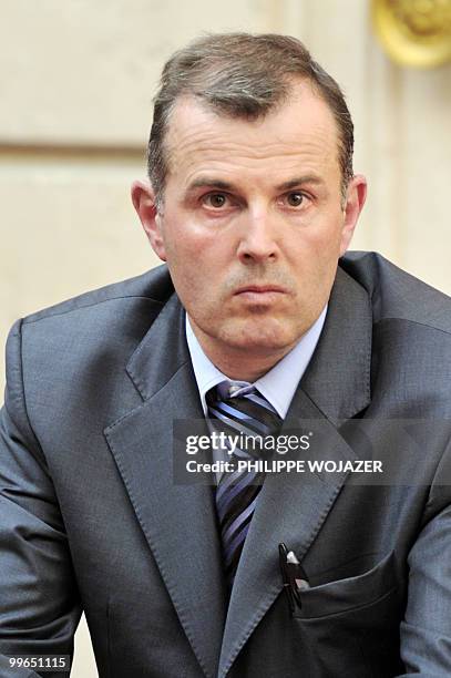 French Intermarche hypermarket group representative Vincent Bronsard attends a meeting on farming trade at the Elysee Palace in Paris, on May 17,...