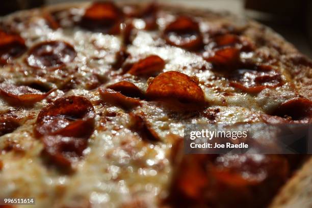 In this photo illustration, a Papa John's pizza is seen on July 11, 2018 in Miami, Florida. The founder of Papa John's pizza, John Schnatter,...