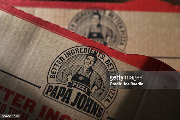 In this photo illustration, a Papa John's pizza box is seen on July 11, 2018 in Miami, Florida. The founder of Papa John's pizza, John Schnatter,...