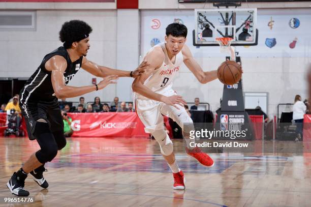 Zhou Qi of the Houston Rockets handles the ball against the Brooklyn Nets during the 2018 Las Vegas Summer League on July 11, 2018 at the Cox...