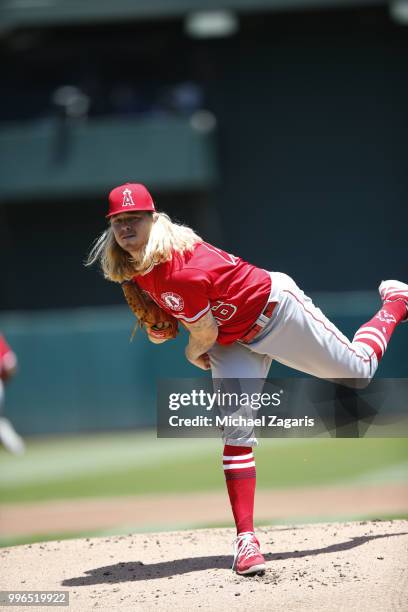 John Lamb of the Los Angeles Angels of Anaheim pitches during the game against the Oakland Athletics at the Oakland Alameda Coliseum on June 16, 2018...