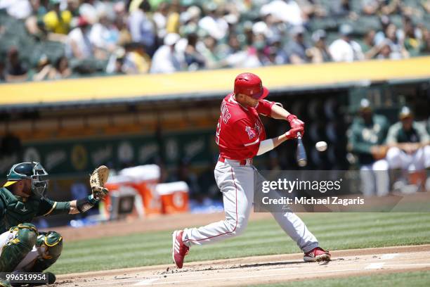 Andrelton Simmons of the Los Angeles Angels of Anaheim bats during the game against the Oakland Athletics at the Oakland Alameda Coliseum on June 16,...