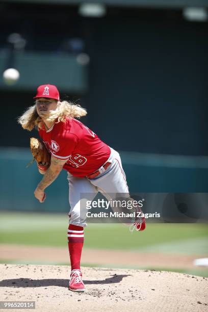 John Lamb of the Los Angeles Angels of Anaheim pitches during the game against the Oakland Athletics at the Oakland Alameda Coliseum on June 16, 2018...