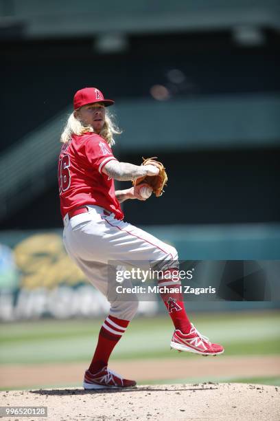 John Lamb of the Los Angeles Angels of Anaheim pitches during the game against the Oakland Athletics at the Oakland Alameda Coliseum on June 16, 2018...