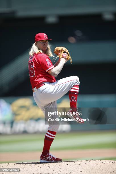 John Lamb of the Los Angeles Angels of Anaheim pitches during the game against the Oakland Athletics at the Oakland Alameda Coliseum on June 16, 2018...