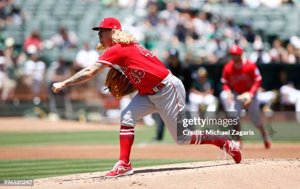 John Lamb of the Los Angeles Angels of Anaheim pitches during the game against the Oakland Athletics at the Oakland Alameda Coliseum on June 16, 2018...