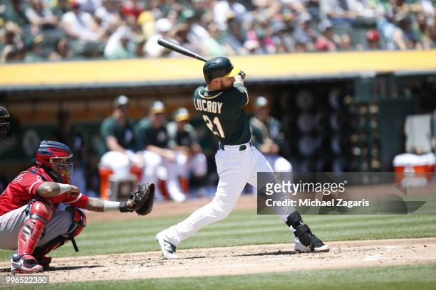 Jonathan Lucroy of the Oakland Athletics bats during the game against the Los Angeles Angels of Anaheim at the Oakland Alameda Coliseum on June 16,...