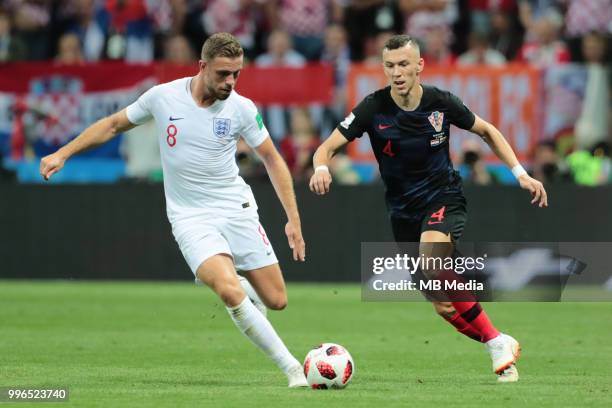 Ivan Perisic of Croatia and Jordan Henderson of England vie for the ball during the 2018 FIFA World Cup Russia Semi Final match between England and...
