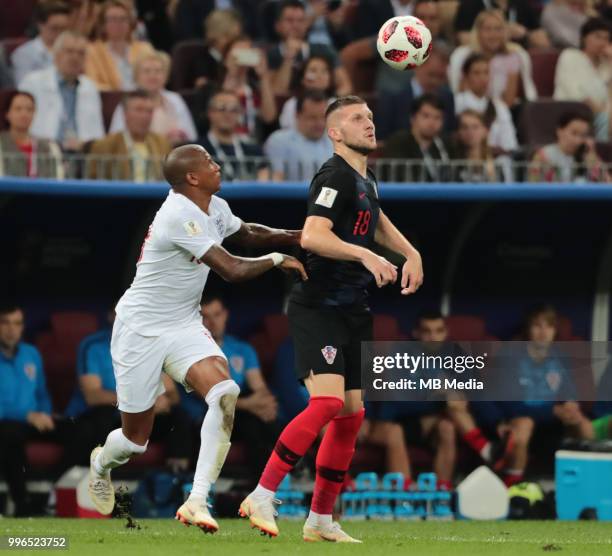 Ante Rebic of Croatia and Ashley Young of England vie for the ball during the 2018 FIFA World Cup Russia Semi Final match between England and Croatia...