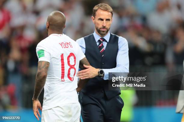 England head coach Gareth Southgate and Ashley Young after the 2018 FIFA World Cup Russia Semi Final match between England and Croatia at Luzhniki...