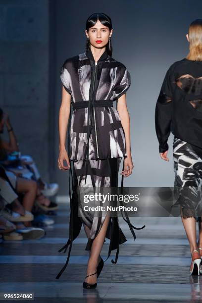 Model presents a creation by Spanish JUAN VIDAL at the fashion show at the Mercedes-Benz Fashion Week Madrid Spring-Summer 2019, in Real Casa se...