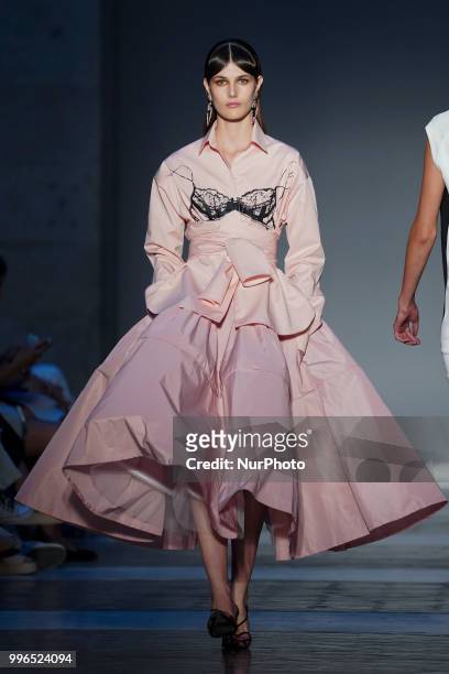 Model presents a creation by Spanish JUAN VIDAL at the fashion show at the Mercedes-Benz Fashion Week Madrid Spring-Summer 2019, in Real Casa se...