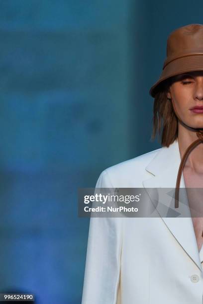 Model presents a creation by Spanish Duarte at the fashion show at the Mercedes-Benz Fashion Week Madrid Spring-Summer 2019, in Real Casa se Correos...