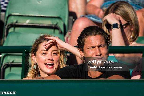 American actress AMBER HEARD and american art curator VITO SCHNABEL during day nine match of the 2018 Wimbledon on July 11 at All England Lawn Tennis...