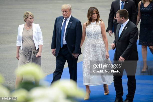President Donald Trump and his wife Melania are seen arriving at the dinner for heads of state at the 2018 NATO Summit in Brussels, Belgium on July...
