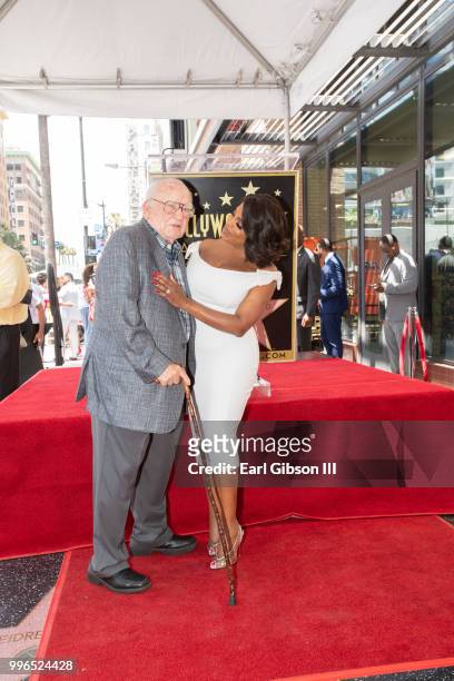 Actor Ed Asner and Niecy Nash pose for a photo as she receives her star on the Hollywood Walk Of Fame on July 11, 2018 in Hollywood, California.