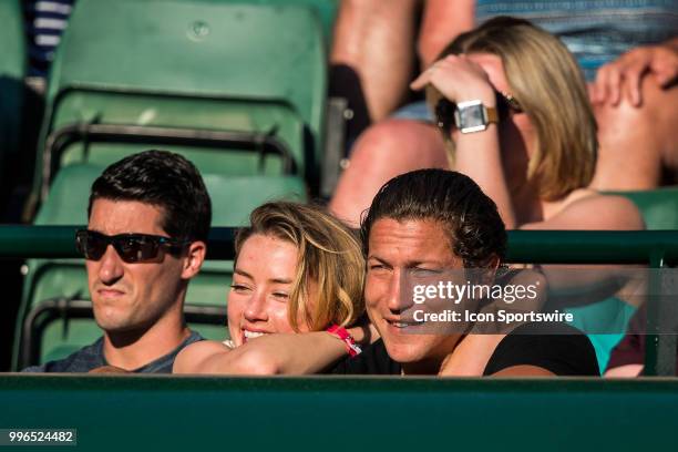 American actress AMBER HEARD and american art curator VITO SCHNABEL during day nine match of the 2018 Wimbledon on July 11 at All England Lawn Tennis...