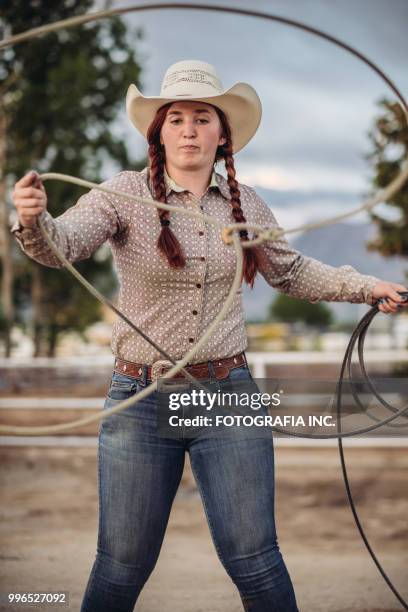 utah  cowgirl with lasso - fotografia stock pictures, royalty-free photos & images