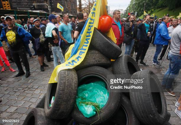 The owners of European-registered cars block Hrushevsky Street in front the Cabinet Ministers of Ukraine, during their a protest in Kiev, Ukraine, 11...