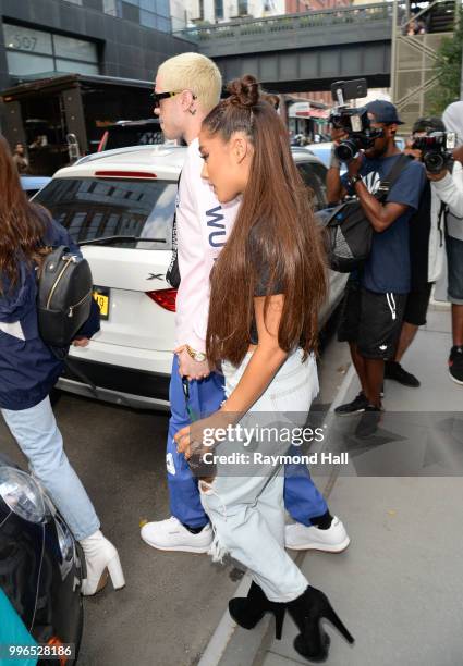 Singer Ariana Grande and Pete Davidson are seen walking in Midtown on July 11, 2018 in New York City.