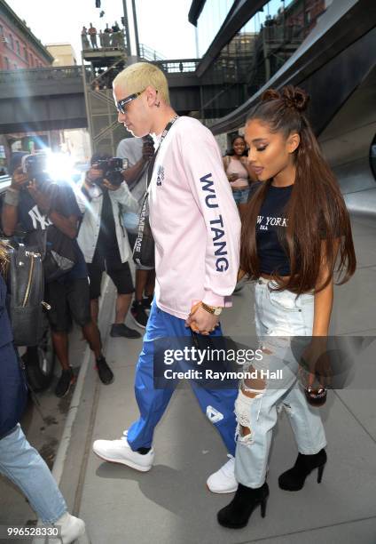 Singer Ariana Grande and Pete Davidson are seen walking in Midtown on July 11, 2018 in New York City.