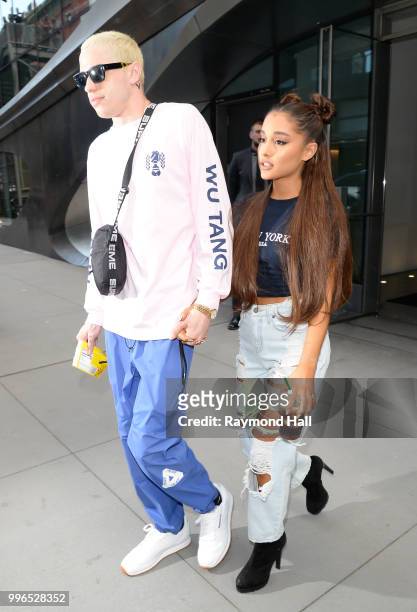 Singer Ariana Grande and Pete Davidson are seen walking in Midtown on July 11, 2018 in New York City.
