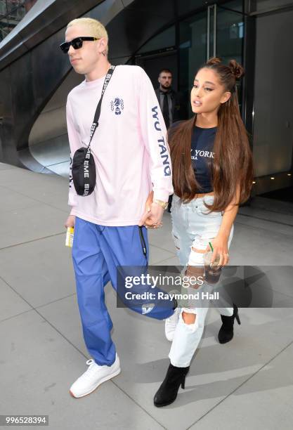 Singer Ariana Grande and Pete Davidson are seen walking in Midtown on July 11, 2018 in New York City.