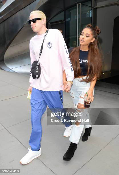 Singer Ariana Grande and Pete Davidson are seen walking in Midtown on July 11, 2018 in New York City.