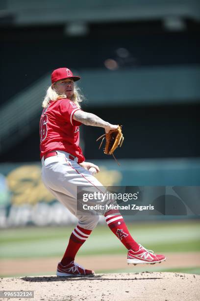 John Lamb of the Los Angeles Angels of Anaheim pitches during the game against the Oakland Athletics at the Oakland Alameda Coliseum on June 16, 2018...