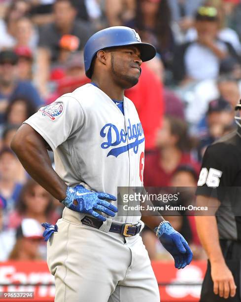 Yasiel Puig of the Los Angeles Dodgers sustained a right intercostal oblique strain wile at bat in the fifth inning against the Los Angeles Angels of...