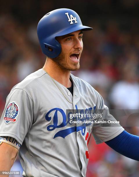 Cody Bellinger of the Los Angeles Dodgers reacts after he was thrown out at first base during the Los Angeles Angels of Anaheim at Angel Stadium on...