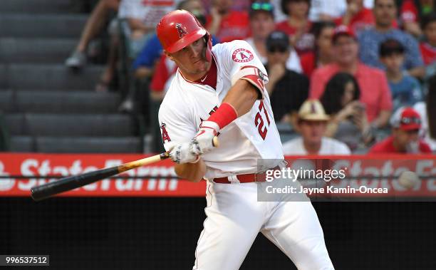 Mike Trout of the Los Angeles Angels of Anaheim at bat in the game against the Los Angeles Dodgers at Angel Stadium on July 8, 2018 in Anaheim,...