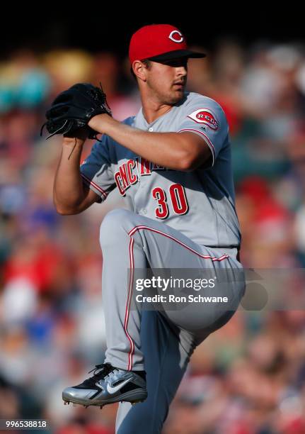 Starting pitcher Tyler Mahle of the Cincinnati Reds pitches against the Cleveland Indians during the first inning at Progressive Field on July 11,...