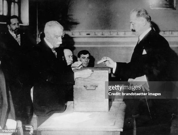 Municipal Elections in France. French Federal President Albert Lebrun,is casting his ballot. Paris. Photograph.