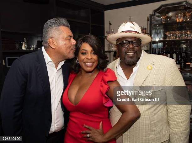 George Lopez, Niecy Nash and Cedric The Entertainer pose for a photo at the celebration honoring Niecy Nash as she is honored with a Star On The...