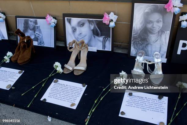 Posters of recently murdered transgender people line Roosevelt Avenue on July 9, 2018 in Jackson Heights, Queens, New York. Many latin transgender...