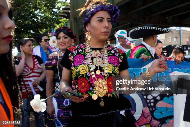 The latinx transgender community marches through a heavily immigrant neighborhood to fight against discrimination and bring awareness to their...