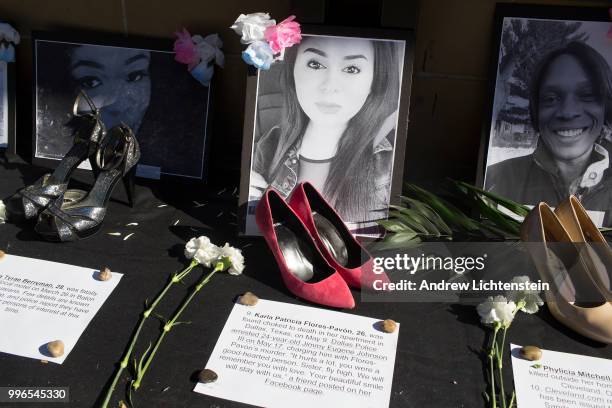 Posters of recently murdered transgender people line Roosevelt Avenue on July 9, 2018 in Jackson Heights, Queens, New York. Many latin transgender...