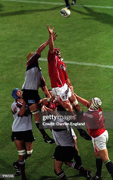 Second row forward Danny Grewcock of the British Lions wins the lineout ball from Mark Connors of the Queensland Reds during the match between the...