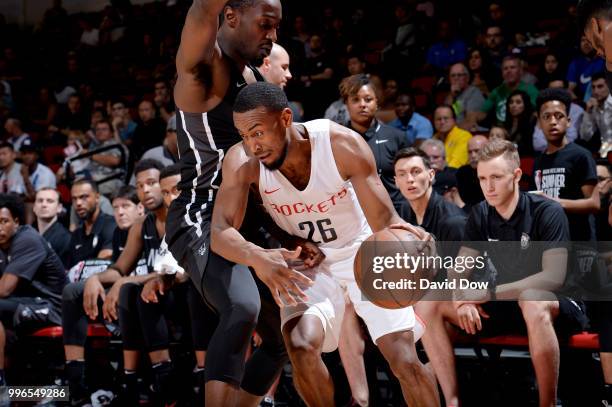 Markel Brown of the Houston Rockets handles the ball against the Brooklyn Nets during the 2018 Las Vegas Summer League on July 11, 2018 at the Cox...