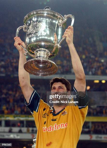 John Eales of the Wallabies holds the Bledisloe Cup aloft after victory in the Tri Nations rugby union match between the Australian Wallabies and the...