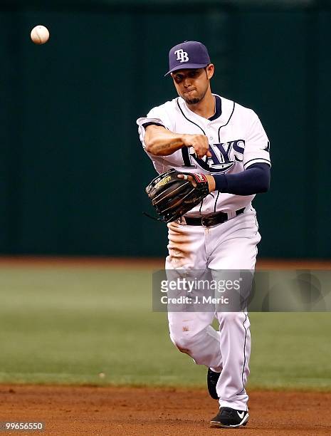 Shortstop Jason Bartlett of the Tampa Bay Rays throws over to first for an out against the Seattle Mariners during the game at Tropicana Field on May...