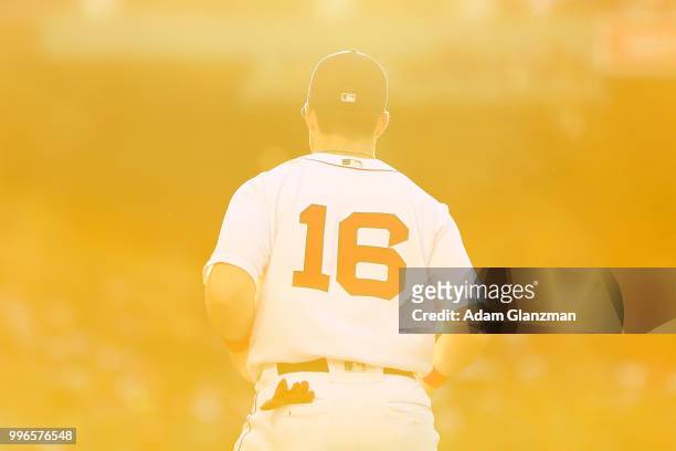 Andrew Benintendi of the Boston Red Sox warms up before a game against the Texas Rangers at Fenway Park on JULY 9, 2018 in Boston, Massachusetts.